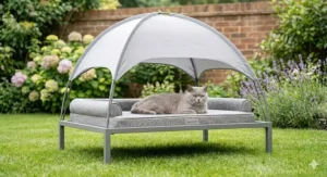 An elevated cooling cat bed with a canopy, ideal for providing shade and ventilation during a UK heatwave.