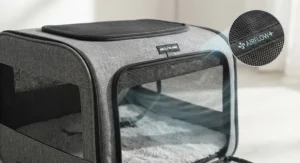 The side view of the carrier highlighting the breathable mesh windows for optimal airflow and visibility.