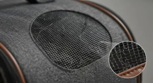 Close-up of the durable mesh panels on an expandable cat carrier, ensuring optimal airflow for your pet.