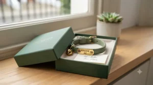 A beautifully packaged engraved cat collar presented in a gift box, ready for posting.